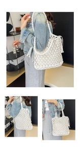 Detail of white handmade woven tote bag with fringe accents and wide shoulder strap