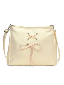 Sweet ballet style shoulder bag in pale yellow with ribbon bow and metal eyelets