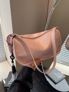 Chic pink marble pattern shoulder bag with tassel pendant for elegant daily commute