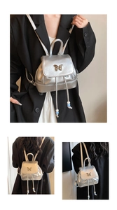 Kleiner silberner Lack-Rucksack mit Schmetterlingsschließe und Perlen-Kordelzug Details