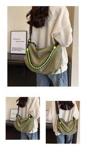 Detailed side view of an olive green oversized nylon crossbody bag with contrast rope