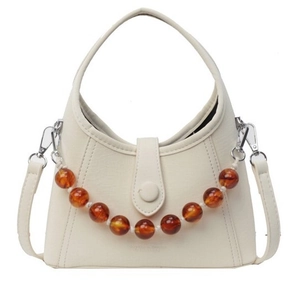 Cream white half-moon crossbody bag with amber bead chain and detachable strap