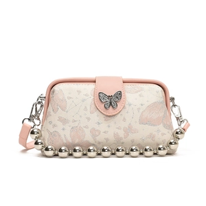 Elegant butterfly embroidery crossbody bag with pink leather trim and metallic bead handle