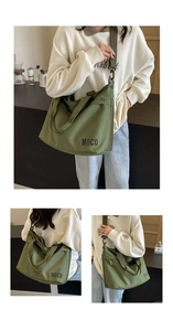 Detail view of olive green large capacity canvas bag with NOCO text and adjustable strap
