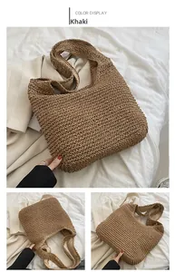 Detailed macro view of khaki woven straw bag showing fine craftsmanship and fabric lining