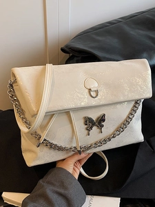 Off-white large tote bag with butterfly ornament and chunky chain shoulder strap