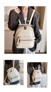 Detail of cream backpack featuring lychee texture and diamond quilted zipper pocket