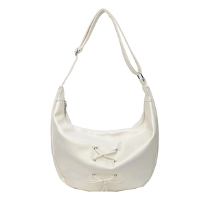 White semi-moon hobo bag with dual lace-up bow details and adjustable shoulder strap