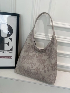 Large capacity tote bag with embossed rose pattern and minimalist shoulder strap design