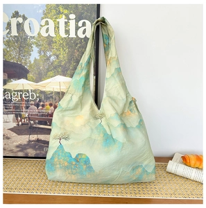 Detail shot of the landscape print on the large capacity tote bag with scenery patterns