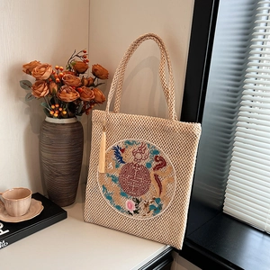 New Chinese style straw tote bag with traditional dragon embroidery and tassel pendant