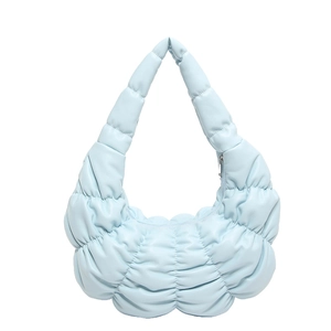 Light blue ruched cloud shoulder bag made of pleated leather with top handle and zip closure