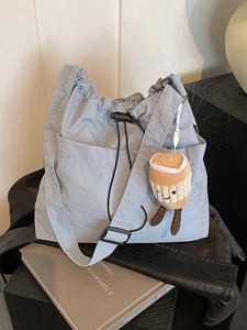 Light blue large capacity canvas tote bag with drawstring closure and cute cup pendant