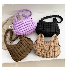 Quilted puff cloud bags in purple, black, and coffee colors with soft padded textures