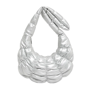 Silver metallic pleated cloud bag with quilted puffer design and silver zipper closure