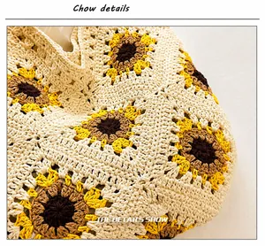 Gros plan du sac en crochet fait main montrant la texture tricotée et la broderie de tournesol