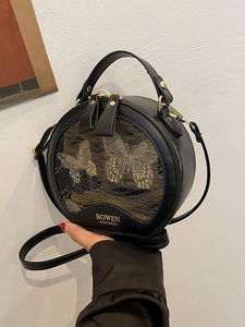 Elegant round black PU leather handbag with golden butterfly embroidery and crossbody strap