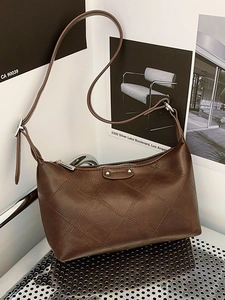 Dark brown leather hobo shoulder bag with quilted diamond pattern and adjustable strap