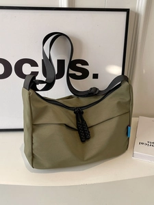 Olive green nylon hobo bag with large capacity and adjustable wide shoulder strap