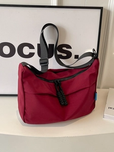 Large capacity dark red nylon dumpling bag with adjustable black shoulder strap