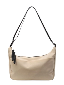 Minimalist large-capacity dumpling shoulder bag in beige nylon with black woven zip pulls