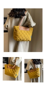 Detail of yellow quilted tote bag with brown faux leather trim and diamond stitching