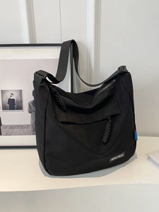Large black nylon tote bag with SHU NUO label and woven drawstring for travel commuting