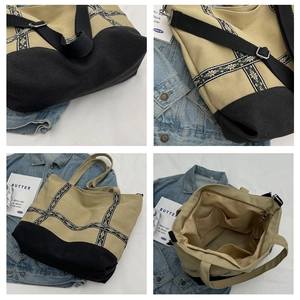 Detail view of khaki canvas tote bag with ethnic embroidery straps and spacious interior