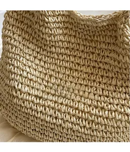Detailed macro shot of the textured hand-woven straw material and high-quality braiding