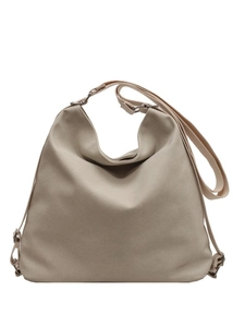 Minimalist beige canvas crossbody tote bag with adjustable wide strap for daily commute