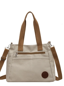 Sac cabas minimaliste en toile crème avec anses brunes et bandoulière réglable