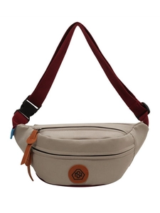 Minimalist beige canvas crossbody chest bag with red strap and orange logo detail