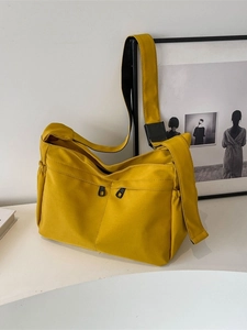 Sac fourre-tout minimaliste jaune vif en toile avec poches zippées et bandoulière