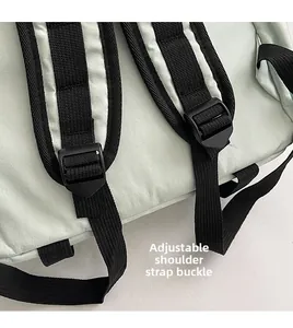 Detail of adjustable shoulder straps with durable black buckles on an outdoor backpack