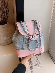 Pink leather and blue sequin denim mini backpack with metal chain straps and twist lock