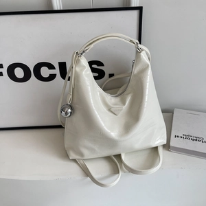 Fashionable white tote bag with crocodile pattern and silver ball pendant for women