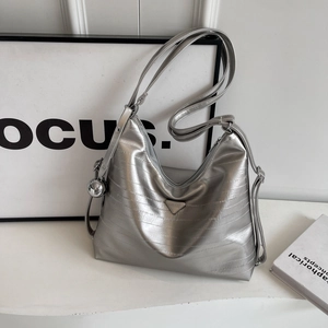 Silver metallic textured hobo shoulder bag with triangle logo and long strap