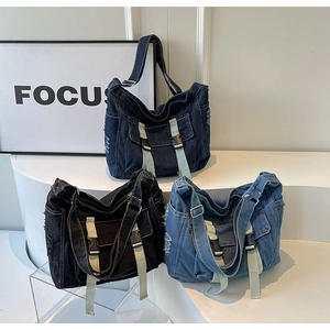 Detailed comparison of large vintage denim tote bags in black, dark blue and light blue