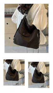 Vista dettagliata della borsa tote nera capiente con tasche multiple e cerniere funzionali