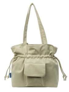 Bolso tote de pana beige con cierre de cordón y bolsillo frontal para el diario