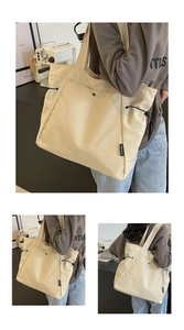 Detail of beige nylon tote bag featuring black drawstring and woven brand label