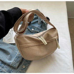 Detail of khaki crescent crossbody bag in nylon fabric with adjustable shoulder strap