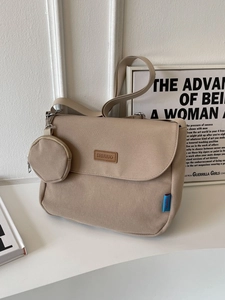 Minimalist khaki canvas shoulder bag set with round mini pouch and logo patch