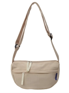 Minimalist beige canvas crossbody bag featuring adjustable strap and front zipper pocket