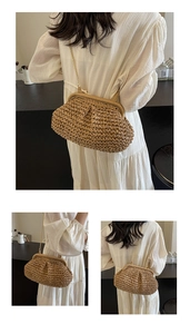 Detailed view of woven straw shell bag with gold chain strap and vintage metal clasp