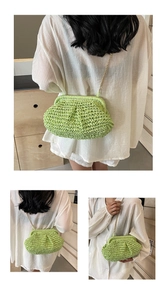 Detail of avocado green woven shell bag with golden metal chain strap and pleat texture