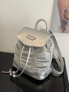 Metallic silver pleated drawstring backpack with fashion bag metal logo and top handle