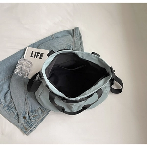 Top view of large mint tote bag showing spacious black lining and interior zipper pocket