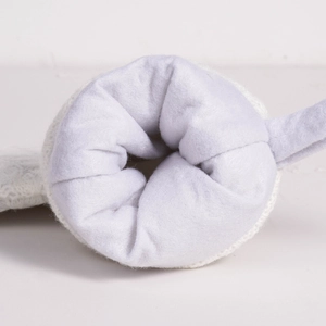 Detailed macro view of soft white knitted fabric and plush gray felt lining texture