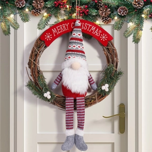 Festive Christmas gnome wreath with rattan hoop and Merry Christmas banner decoration